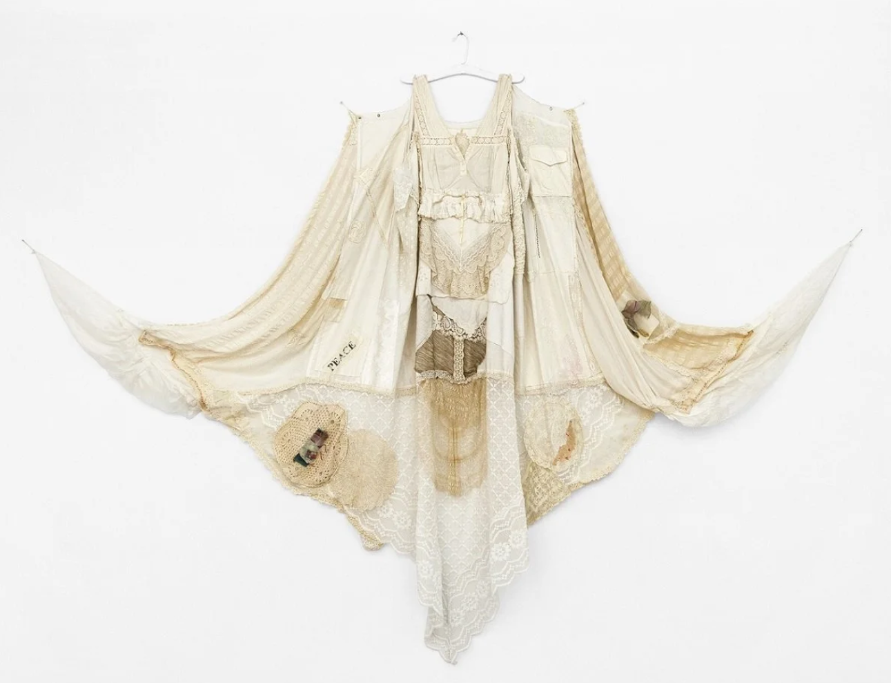 Fabric of Resurrection and Redemption: The Gown of Stillness